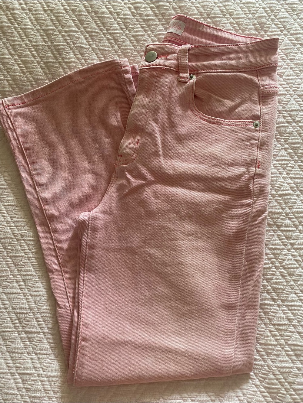 Pink white washed denim jeans